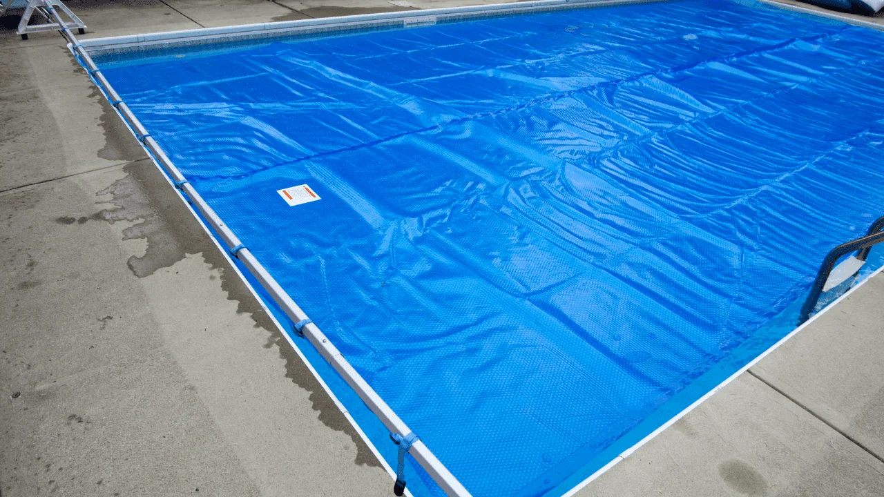 pool with solar pool cover